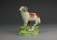 Lot 17 - A Staffordshire ram and ewe group, circa 1820,...