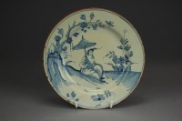 Lot 33 - An English blue and white delft plate, 18th...