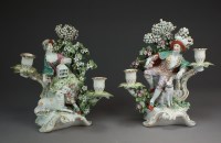 Lot 36 - A pair of Derby porcelain twin-branch...