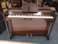 Lot 163 - An Orpheon mahogany case upright piano with...