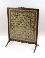 Lot 215 - An Edwardian satinwood framed fire screen the...