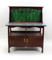 Lot 221 - An Arts and Crafts mahogany three piece...