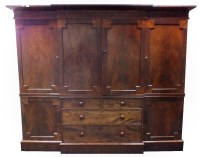 Lot 228 - A William IV mahogany break front triple...