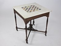 Lot 273 - A late Victorian walnut marble topped chess...