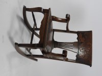 Lot 280 - A late Victorian oak and leather rocking chair...