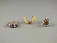 Lot 14 - A 9ct gold citrine and split pearl cluster...