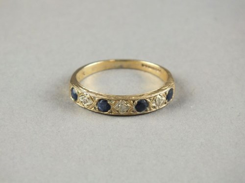 Lot 15 - A 9ct gold half eternity ring, weight 2.1g