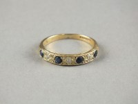 Lot 15 - A 9ct gold half eternity ring, weight 2.1g