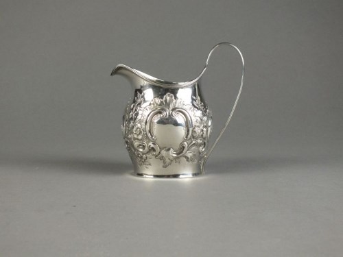 Lot 42 - A George III silver jug, London 1799, with...