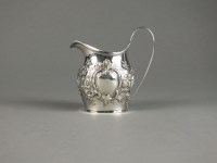 Lot 42 - A George III silver jug, London 1799, with...