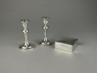 Lot 51 - A pair of short silver candlesticks (at fault),...