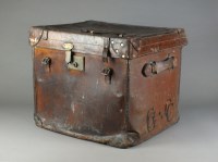 Lot 64 - A leather travelling trunk with pull out tray...