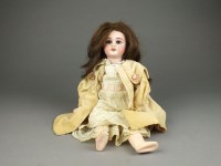 Lot 65 - A bisque head doll, the neck marked with the...