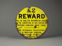 Lot 79 - A small circular enamel £2 reward sign issued...