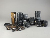 Lot 88 - An Olympus OM-4 Ti 35mm SLR camera, with an...