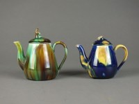 Lot 118 - Two teapots and covers in a Whieldon-type...