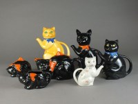 Lot 146 - Three trays of novelty cat related teapots and...