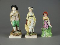 Lot 156 - A group of three Staffordshire figures, early...