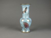 Lot 176 - A pale blue vase decorated with butterflies...