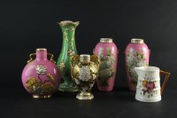 Lot 190 - A pair of Coalport pink ground vases, painted...