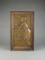 Lot 230 - An Art Nouveau relief cast metal plaque of a...