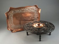 Lot 239 - An Art Nouveau beaten copper tray with...