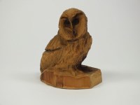 Lot 296 - A carved wood sculpture of a barn owl on...