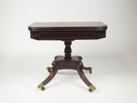 Lot 305 - A late Regency mahogany tea table the...