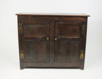 Lot 306 - An oak cupboard, first half 18th century, the...