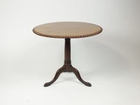 Lot 312 - A George III mahogany tripod table the...