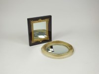 Lot 327 - A gilt framed wall mirror in a glass display...