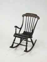 Lot 340 - A Scandinavian child's black painted rocking...