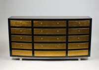 Lot 347 - A modern black and gold coloured bow front...