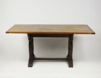 Lot 348 - An oak refectory table, the mitred rectangular...