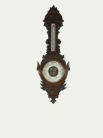 Lot 362 - A Victorian carved oak aneroid barometer with...