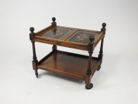 Lot 388 - A walnut two tier tea trolley, part Victorian,...