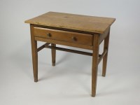 Lot 424 - A waxed pine side table with rectangular two...